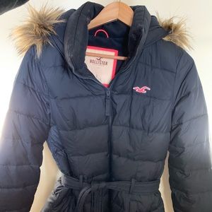 Hollister puffer jacket with a fur lined hood.